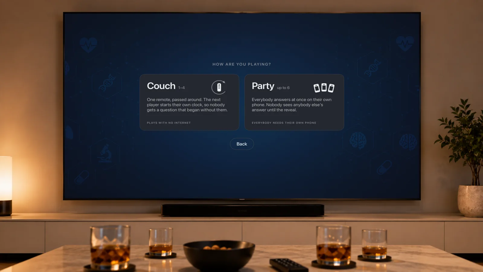 The “How are you playing?” screen offering two cards: Couch for one to four players, which plays with no internet, and Party for up to six players, where everybody needs their own phone