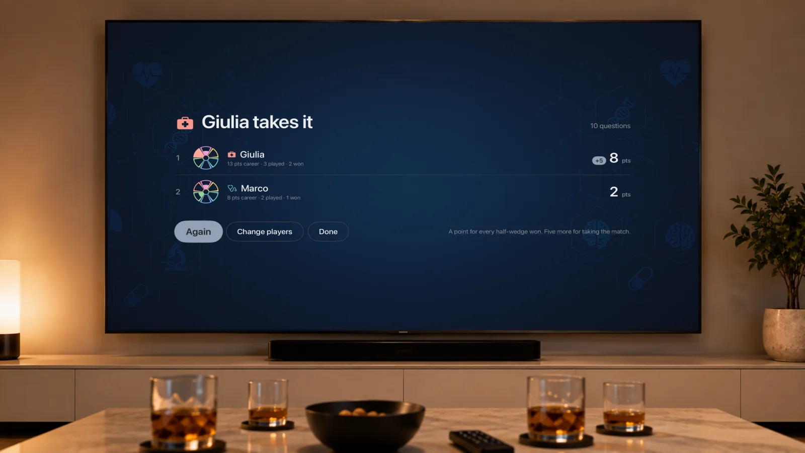 The final scoreboard: “Giulia takes it” after 10 questions, with Giulia on 8 points and Marco on 2, each showing their career points, matches played and matches won, and Again, Change players and Done buttons